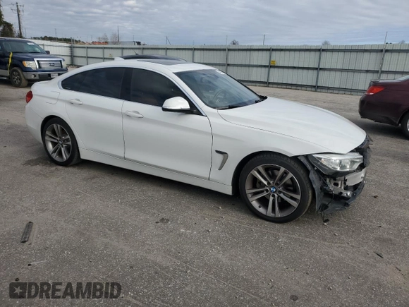 2016 BMW 4 Series 428i with VIN WBA4A9C57GGL87882, listed as a Copart auction lot 84609184 with 139,959 mi miles and Salvage title. Bid and sale history available at DreamBid. Image 4.