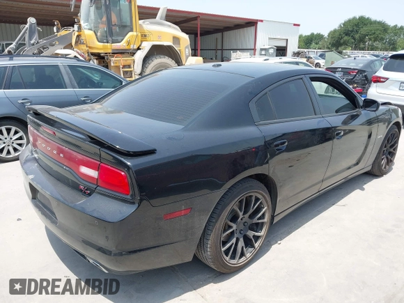 2014 Dodge Charger RT z VIN 2C3CDXCT4EH337763, wystawiony jako IAAI lot #42281217 z przebiegiem 121 653 mil mil oraz . Historia ofert i sprzedaży dostępna na DreamBid. Obrazek 4.