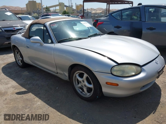 1999 Mazda MX-5 Miata with VIN JM1NB3539X0131393, listed as a IAAI auction lot 42439850 with 210,710 mi miles and . Bid and sale history available at DreamBid. Image 1.
