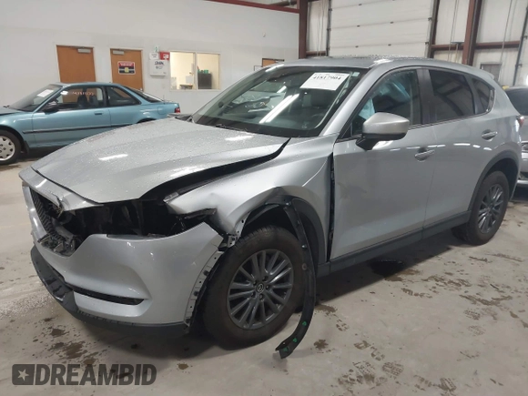 2020 Mazda CX-5 Touring with VIN JM3KFBCMXL0784653, listed as a IAAI auction lot 41817904 with 71,513 mi miles and . Bid and sale history available at carsss.com. Image 17.