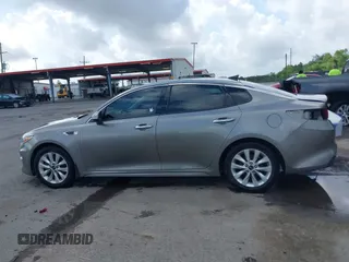 2018 Kia Optima EX with VIN 5XXGU4L36JG253629, listed as a IAAI auction lot 42079946 with 136,575 mi miles and . Bid and sale history available at carsss.com. Image 15.