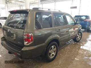 2006 Honda Pilot EX-L with VIN 5FNYF187X6B026463, listed as a IAAI auction lot 41612181 with 242,828 mi miles and . Bid and sale history available at DreamBid. Image 4.