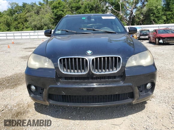 2012 BMW X5 35i with VIN 5UXZV4C54CL744502, listed as a Copart auction lot 57828115 with 161,597 mi miles and Clean title. Bid and sale history available at DreamBid. Image 5.