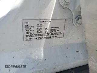 2023 Tesla Model Y Long Range z VIN 7SAYGDEE4PA064502, wystawiony jako Copart lot #53337645 z przebiegiem 16 945 mil mil oraz Szkoda całkowita • Salvage title. Historia ofert i sprzedaży dostępna na DreamBid. Obrazek 13.