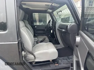 2007 Jeep Wrangler Rubicon with VIN 1J4GA64127L170574, listed as a IAAI auction lot 42474509 with 142,976 mi miles and . Bid and sale history available at DreamBid. Image 5.