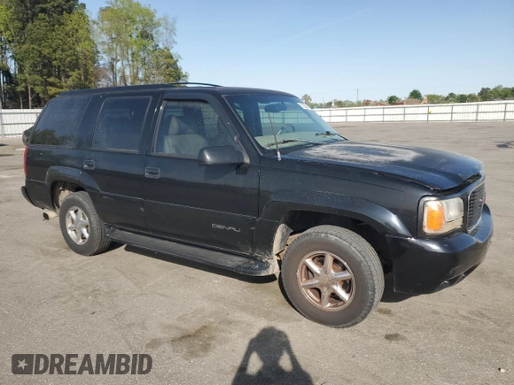 1999 GMC Denali with VIN 1GKEK13R1XR912632, listed as a Copart auction lot 51223085 with 223,201 mi miles and Salvage Title. Bid and sale history available at carsss.com. Image 4.