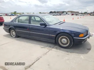1997 BMW 7 Series 740il with VIN WBAGJ8324VDM02317, listed as a Copart auction lot 64879564 with 107,365 mi miles and Salvage Title. Bid and sale history available at carsss.com. Image 4.