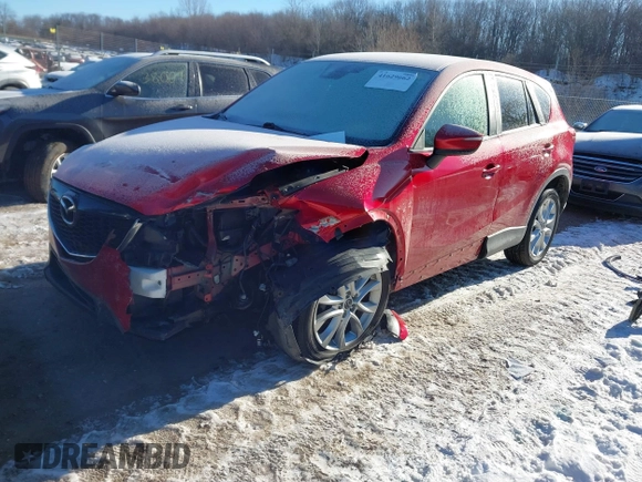 2015 Mazda CX-5 Grand Touring with VIN JM3KE4DY0F0538246, listed as a IAAI auction lot 41629662 with 87,788 mi miles. Bid and sale history available at carsss.com. Image 2.