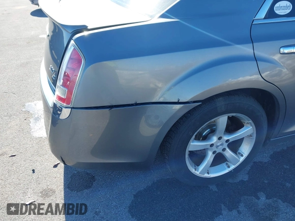 2011 Chrysler 300 with VIN 2C3CA6CTXBH563112, listed as a IAAI auction lot 41374372 with 151,947 mi miles. Bid and sale history available at carsss.com. Image 13.