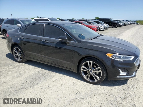 2019 Ford Fusion Titanium with VIN 3FA6P0D94KR205165, listed as a Copart auction lot 51829545 with 119,692 mi miles and Clean Title. Bid and sale history available at carsss.com. Image 4.