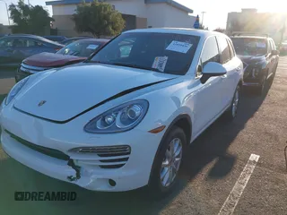 2014 Porsche Cayenne with VIN WP1AA2A28ELA96123, listed as a IAAI auction lot 42010456 with 154,312 mi miles and . Bid and sale history available at DreamBid. Image 2.