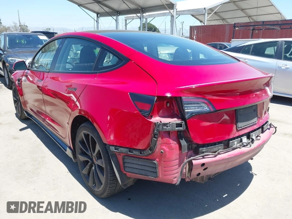 2023 Tesla Model 3 z VIN 5YJ3E1EA4PF454981, wystawiony jako IAAI lot #42704135 z przebiegiem 93 008 mil mil oraz . Historia ofert i sprzedaży dostępna na DreamBid. Obrazek 3.