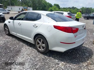 2014 Kia Optima LX with VIN 5XXGM4A74EG317632, listed as a IAAI auction lot 42172027 with 122,879 mi miles and . Bid and sale history available at DreamBid. Image 3.