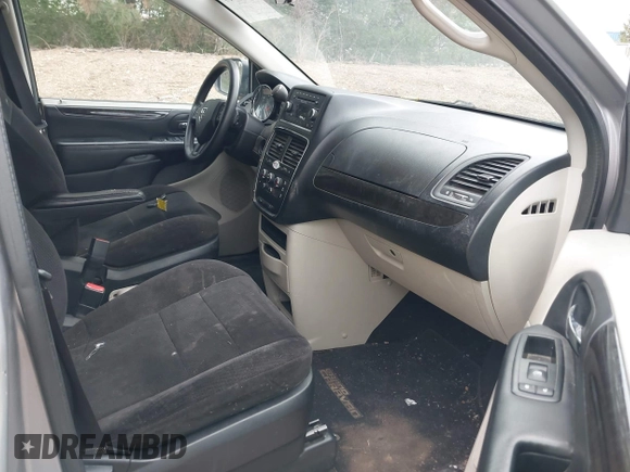 2014 Dodge Grand Caravan American Value with VIN 2C4RDGBG0ER168085, listed as a IAAI auction lot 42020959 with 213,383 mi miles and . Bid and sale history available at DreamBid. Image 5.