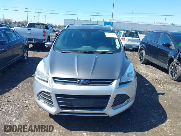 2014 Ford Escape Titanium with VIN 1FMCU9JX1EUB94776, listed as a IAAI auction lot 42063678 with 138,036 mi miles. Bid and sale history available at carsss.com. Image 12.