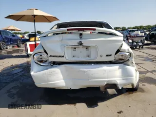2000 Nissan Maxima GXE z VIN JN1CA31D2YT523871, wystawiony jako Copart lot #65902984 z przebiegiem 235 064 mil mil oraz Szkoda całkowita • Salvage title. Historia ofert i sprzedaży dostępna na DreamBid. Obrazek 6.