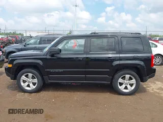 2014 Jeep Patriot Latitude with VIN 1C4NJRFB1ED616001, listed as a IAAI auction lot 42722459 with 81,561 mi miles and . Bid and sale history available at DreamBid. Image 14.