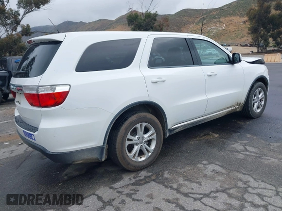 2013 Dodge Durango SXT z VIN 1C4RDHAG7DC694986, wystawiony jako IAAI lot #42181381 z przebiegiem 170 669 mil mil oraz . Historia ofert i sprzedaży dostępna na DreamBid. Obrazek 4.