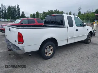 2002 Ford F-150 XL with VIN 1FTRX17L32NA19687, listed as a IAAI auction lot 42577258 with 216,685 mi miles and . Bid and sale history available at DreamBid. Image 4.