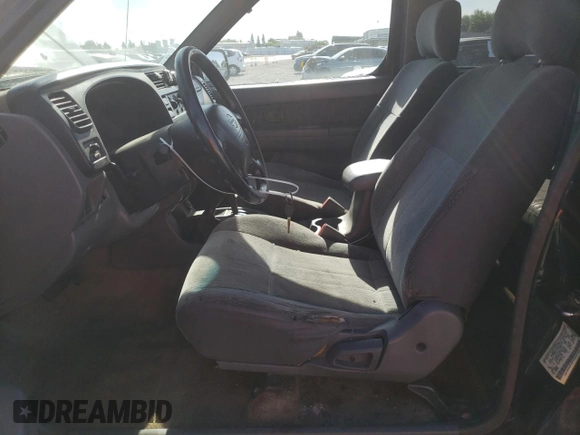 2000 Nissan Frontier XE z VIN 1N6ED27Y3YC324102, wystawiony jako Copart lot #56922155 z przebiegiem 202 233 mil mil oraz Szkoda całkowita • Salvage title. Historia ofert i sprzedaży dostępna na DreamBid. Obrazek 7.