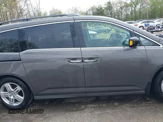 2013 Honda Odyssey Touring with VIN 5FNRL5H94DB013310, listed as a IAAI auction lot 42079565 with 128,622 mi miles and . Bid and sale history available at carsss.com. Image 13.