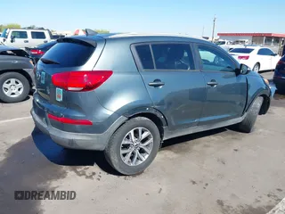 2015 Kia Sportage LX with VIN KNDPB3ACXF7696918, listed as a IAAI auction lot 42179023 with 64,181 mi miles and . Bid and sale history available at DreamBid. Image 4.