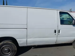 2010 Ford Econoline Cargo Commercial with VIN 1FTSE3EL9ADA46967, listed as a IAAI auction lot 41562287 with 162,158 mi miles and . Bid and sale history available at carsss.com. Image 13.