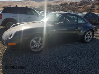 1996 Porsche 911 with VIN WP0DA2996TS385231, listed as a Copart auction lot 83699964 with 60,492 mi miles and Salvage title. Bid and sale history available at DreamBid. Image 1.
