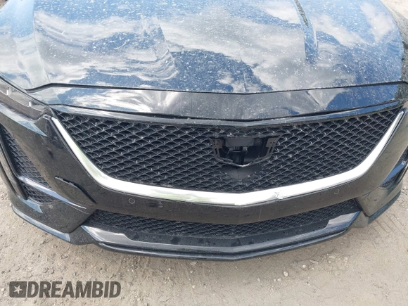 2024 Cadillac CT5 Sport z VIN 1G6DP5RK3R0127081, wystawiony jako IAAI lot #42319697 z przebiegiem 4 093 mil mil oraz . Historia ofert i sprzedaży dostępna na DreamBid. Obrazek 18.