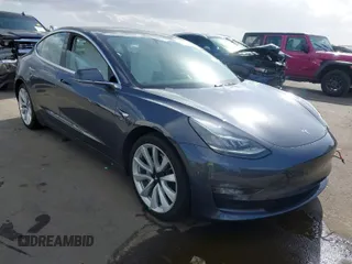 2018 Tesla Model 3 Long Range Battery with VIN 5YJ3E1EA5JF169097, listed as a IAAI auction lot 41916873 with 81,919 mi miles. Bid and sale history available at carsss.com. Image 1.