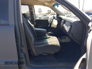 2004 Dodge Dakota Sport with VIN 1D7HG38K84S608161, listed as a IAAI auction lot 41863394 with 145,288 mi miles and . Bid and sale history available at DreamBid. Image 5.