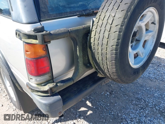 1995 Isuzu Rodeo z VIN 4S2CM58V4S4363500, wystawiony jako IAAI lot #41821801 z przebiegiem 94 480 mil mil oraz . Historia ofert i sprzedaży dostępna na DreamBid. Obrazek 13.