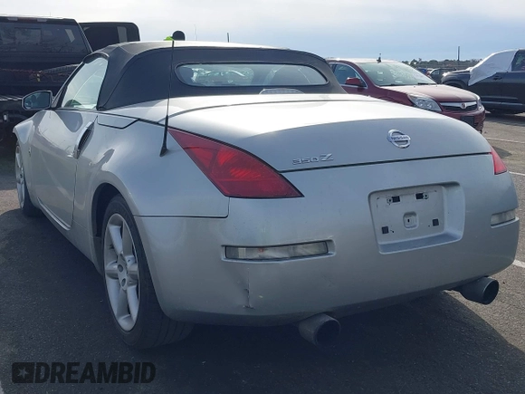 2005 Nissan 350Z Touring z VIN JN1AZ36A05M755776, wystawiony jako IAAI lot #41509506 z przebiegiem 79 148 mil mil oraz . Historia ofert i sprzedaży dostępna na DreamBid. Obrazek 3.