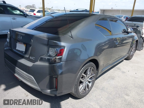 2015 Scion tC with VIN JTKJF5C7XF3088807, listed as a IAAI auction lot 41958463 with 87,647 mi miles. Bid and sale history available at carsss.com. Image 4.