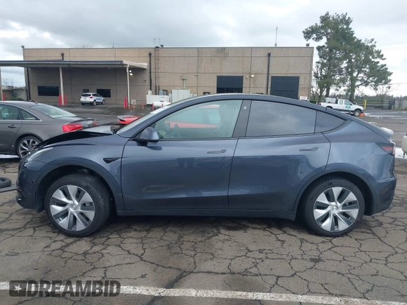 2022 Tesla Model Y Long Range with VIN 7SAYGDEE8NF317482, listed as a IAAI auction lot 41806043 with 32,108 mi miles and . Bid and sale history available at carsss.com. Image 15.