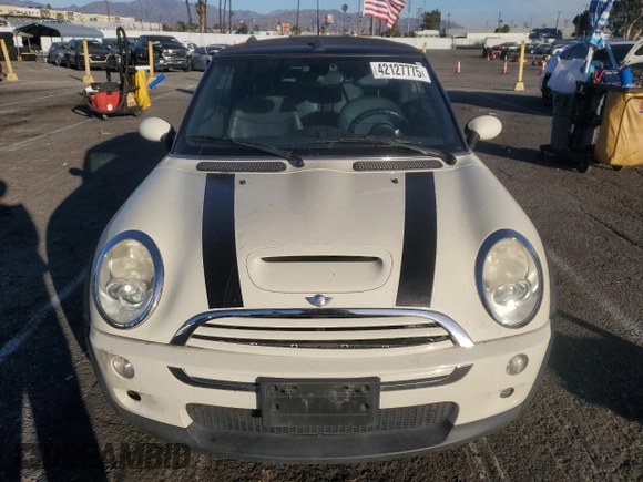 2007 MINI Convertible S with VIN WMWRH33567TL94957, listed as a Copart auction lot 42127775 with 90,401 mi miles and Salvage title. Bid and sale history available at DreamBid. Image 5.