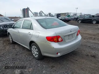 2010 Toyota Corolla with VIN 1NXBU4EE7AZ206138, listed as a IAAI auction lot 41607099 with 189,728 mi miles. Bid and sale history available at carsss.com. Image 3.
