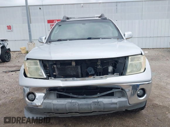 2005 Nissan Frontier LE with VIN 1N6AD07U25C457977, listed as a IAAI auction lot 41906592 with 256,116 mi miles and . Bid and sale history available at DreamBid. Image 13.