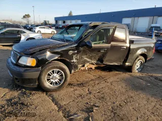 2001 Ford F-150 SuperCrew XLT with VIN 1FTRW07L71KA04123, listed as a Copart auction lot 48477755 with 128,808 mi miles and Clean Title. Bid and sale history available at carsss.com. Image 1.