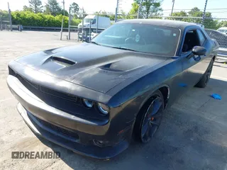 2023 Dodge Challenger GT z VIN 2C3CDZJG2PH610641, wystawiony jako IAAI lot #42052150 z przebiegiem 11 413 mil mil oraz . Historia ofert i sprzedaży dostępna na DreamBid. Obrazek 2.