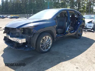 2020 Lexus RX with VIN 2T2JZMDA2LC223392, listed as a IAAI auction lot 42028542 with 55,739 mi miles. Bid and sale history available at carsss.com. Image 22.