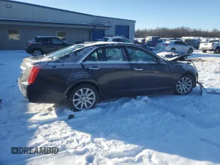 2016 Cadillac CTS AWD with VIN 1G6AW5SXXG0107872, listed as a Copart auction lot 87631955 with 51,624 mi miles and Salvage title. Bid and sale history available at DreamBid. Image 3.