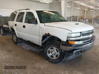 2004 Chevrolet Tahoe LT z VIN 1GNEK13ZX4J256427, wystawiony jako IAAI lot #41682840 z przebiegiem Nie podano mil oraz . Historia ofert i sprzedaży dostępna na DreamBid. Obrazek 1.