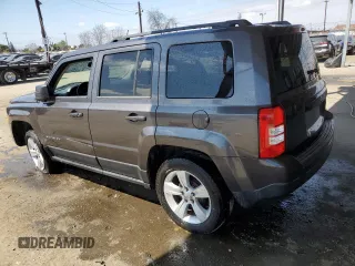 2014 Jeep Patriot Latitude with VIN 1C4NJPFB9ED822901, listed as a Copart auction lot 51005655 with 130,149 mi miles and Salvage Title. Bid and sale history available at carsss.com. Image 2.