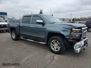 2014 Chevrolet Silverado 1500 LTZ with VIN 3GCUKSEC9EG197800, listed as a Copart auction lot 85949324 with 214,246 mi miles and Salvage Title. Bid and sale history available at carsss.com. Image 4.