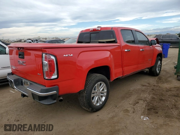 2018 GMC Canyon 4WD SLT with VIN 1GTG6DEN0J1158147, listed as a Copart auction lot 76594794 with 41,186 mi miles and Salvage Title. Bid and sale history available at carsss.com. Image 3.