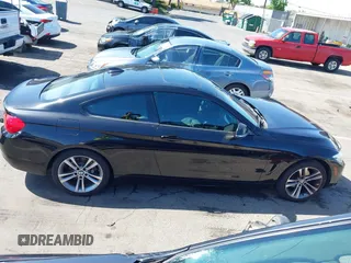 2014 BMW 4 Series 428i xDrive with VIN WBA3N9C53EK244907, listed as a IAAI auction lot 42380025 with 71,431 mi miles and . Bid and sale history available at DreamBid. Image 13.