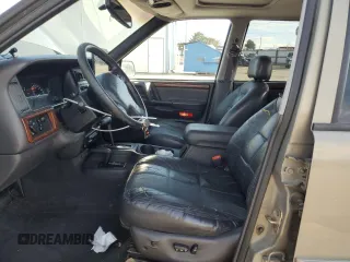 1997 Jeep Grand Cherokee Limited with VIN 1J4GZ78Y4VC754624, listed as a Copart auction lot 49884435 with 144,682 mi miles and Salvage Title. Bid and sale history available at carsss.com. Image 7.