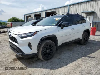 2023 Toyota RAV4 Hybrid XSE with VIN 2T3E6RFVXPW040152, listed as a Copart auction lot 61645565 with 26,408 mi miles and Salvage title. Bid and sale history available at DreamBid. Image 1.
