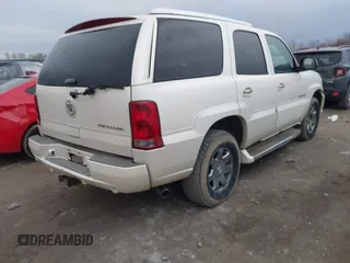 2005 Cadillac Escalade with VIN 1GYEK63NX5R121562, listed as a IAAI auction lot 41923728 with 242,610 mi miles and . Bid and sale history available at DreamBid. Image 4.